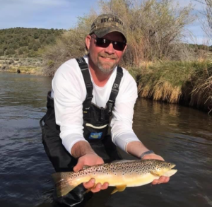 Trout in fishermans hands