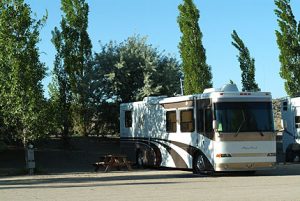 Large RV in Site with mature trees